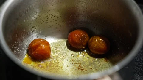 Cooking cherry in a pan in slow motion Stock Footage 339959662