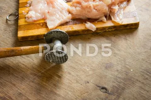 Cooking Chicken Chops With Meat Hammer