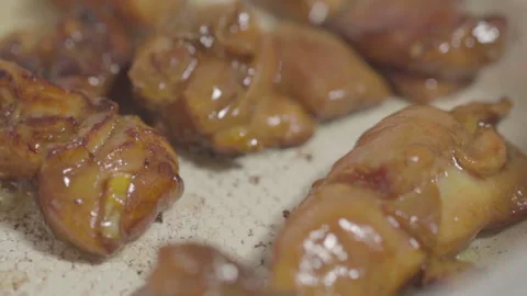 Cooking chicken cubes in a pan Stock Footage 141100755
