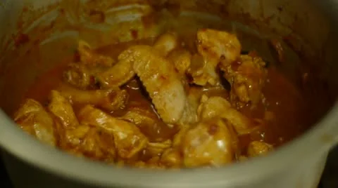 Cooking chicken curry Stock-Footage 11232356
