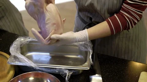 Cooking chicken at the kitchen Stock Footage 77233171