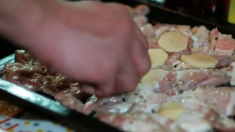 Cooking chicken in the oven Stock Footage 73990178