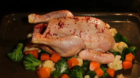 Cooking chicken in oven time lapse Video stock 62531727