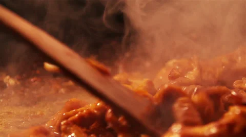 Cooking chicken in a pan: thay cusine Stock Footage 36996751