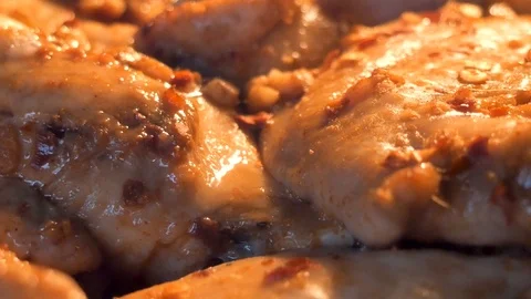 Cooking chicken wings in the oven. Stock Footage 117282136
