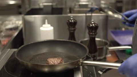 Cooking Chief Flip Red Meat Stock Footage 87560143