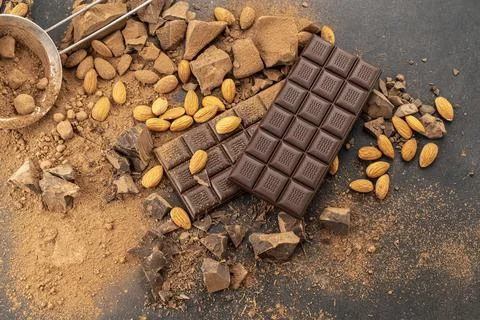 Cooking chocolate bars with almonds, desserts, handmade sweets. Composition of Stock Photos