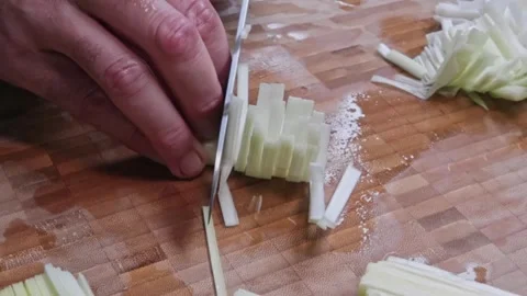 Cooking: Chopping leaks Video stock 278348328