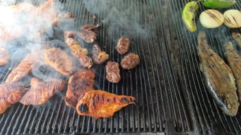 Cooking on a city street on an open fire Stock Footage 158665053