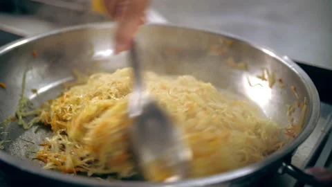 Cooking. close-up. on the stove, cabbage is stewed in a frying pan Stock-Footage 168533966