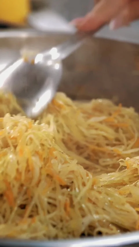 Cooking. close-up. on the stove, cabbage is stewed in a frying pan Stock-Footage 319016975