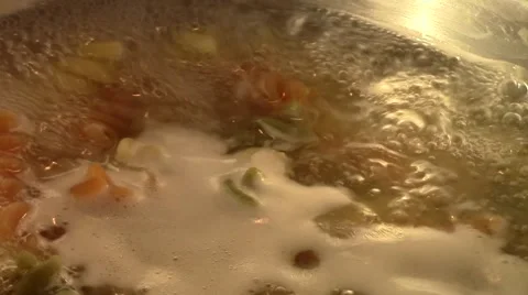 Cooking colorful pasta Stock Footage 60749700