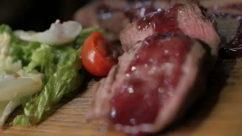 Cooking concept. Grilled marinated beef flank steak on wooden board Stock Footage 108785213