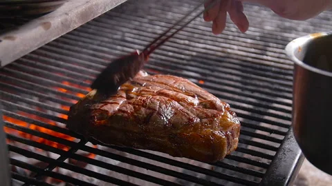 Cooking concept. Marinating meat during grilling Stock Footage 101844454