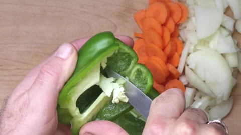 Cooking: Coring a green pepper Video stock 278348218