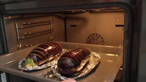 Cooking Corn on the Cob in Oven at Cooking Location Video stock 341427117