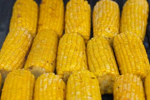 Cooking corn on the grill Stock Photos