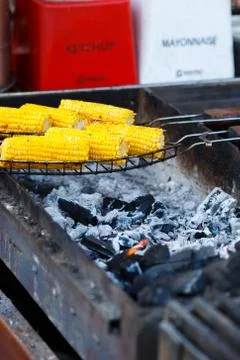 Cooking corn on the grill Stock Photos