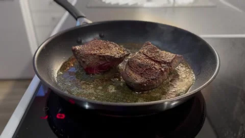 Cooking a couple of steaks Stock Footage 255458367