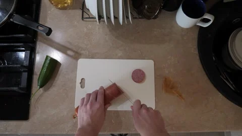 Cooking in a cozy kitchen Stock Footage 317052110