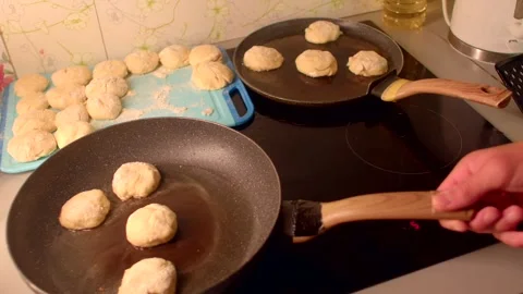 Cooking in cozy kitchen, Preparing breakfast with quick hand movements Stock Footage 321028132