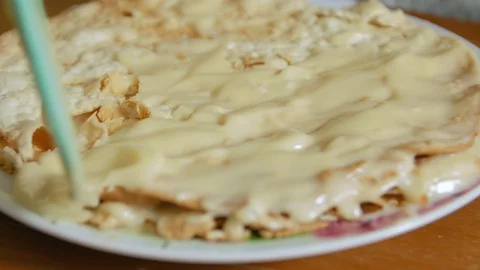 Cooking Cream Cake Stock Footage 129169514