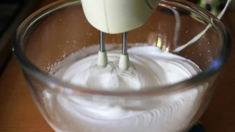 Cooking cream. Mixer interferes with cake cream. 動画素材 147482053