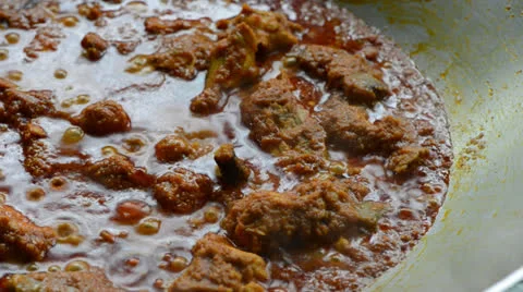 Cooking curry chicken 库存影片 26181212