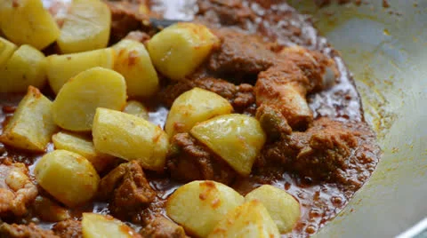 Cooking curry chicken Video stock 26181288