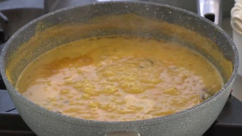 Cooking curry sauces Stock Footage 75864734