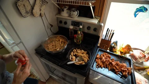 Cooking cut up chicken in pan Stock Footage 95685959