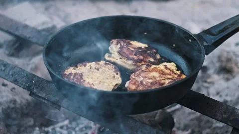Cooking Cutlets on Campfire Stock Footage 284670366