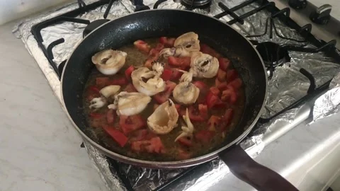 Cooking Cuttlefishes With Tomatoes Stock Footage 130916065