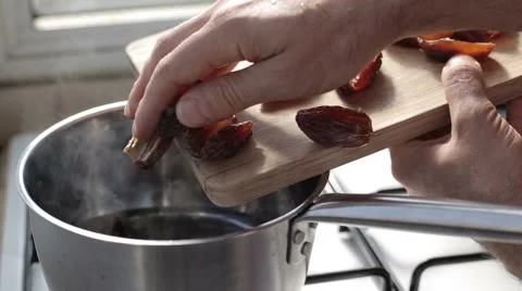 Cooking dates in boiled water Stock Footage 58535255