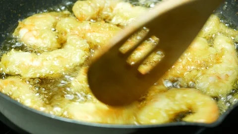Cooking deep batter-fried prawns , fried shrimps with flour powder in the boi Stock Footage 89748989