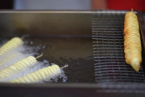 Cooking in deep fat Stock Photos