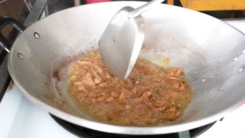 Cooking deep fried pork belly with garlic Stock Footage 194994766