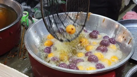 Cooking deep fried potato balls Stock Footage 109545330