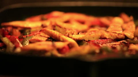 Cooking delicious chicken with vegetables Stock Footage 232932026