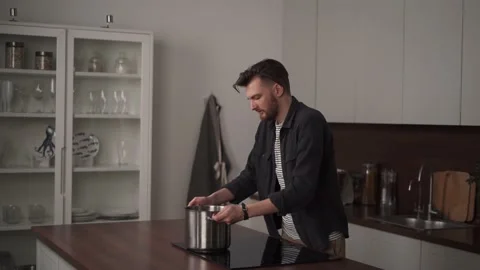 Cooking a delicious dish in a modern kitchen. Stock Footage 169048270