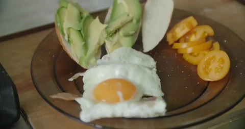 Cooking Delicious Fried Eggs in NonStick Cooking Pan Stock-Footage 302479061