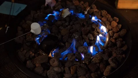 Cooking delicious marshmallows on a bonfire. Stock Footage 122440924