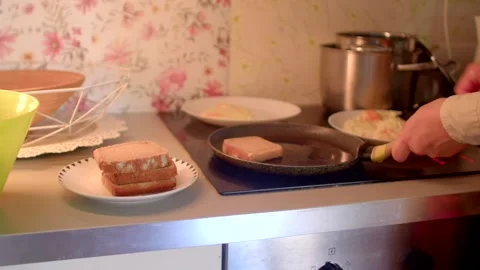 Cooking Delicious Sandwiches on Stove Using Various Ingredients and Plates Stock Footage 318924261