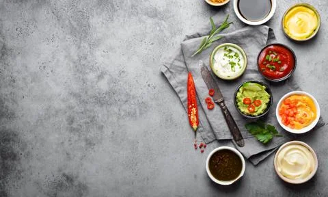 Cooking different sauces Foto stock