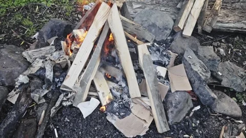 Cooking dinner on the fire 스톡 동영상 285543581