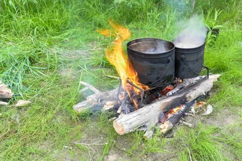 Cooking dinner at the stake. Stock-Fotos