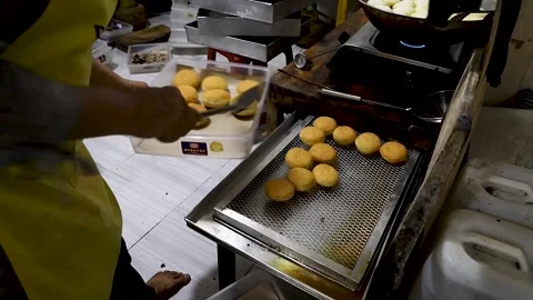 Cooking donuts Stock Footage 276150184