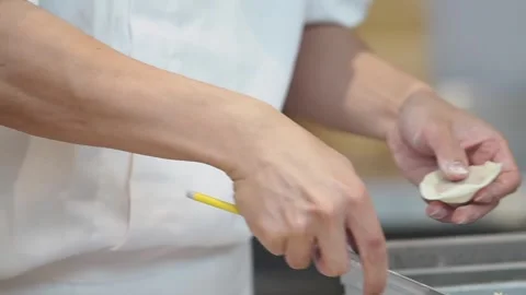 Cooking dumplings in a kitchen with steam baskets Stock Footage 338271879