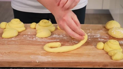 Cooking Easter bunnies from dough Stock Footage 169571929