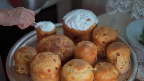 Cooking Easter cakes of different sizes for Easter Stock Footage 129517539